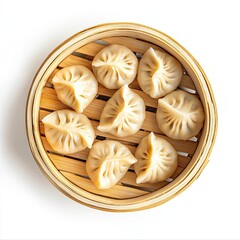 Top view of a bamboo basket with mandu (dumplings) isolated on white background