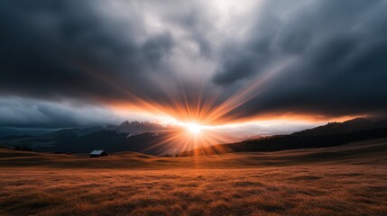 A sunburst pierces dramatic clouds, draping the rolling fields in a mix of light and shadow, embodying a dynamic, captivating, and awe-inspiring beauty.