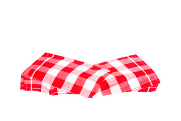 Closeup of a red and white checkered napkin or tablecloth texture isolated on white background. Kitchen accessories. Top view.