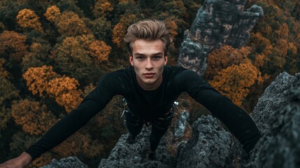 Naklejka premium rock climber selfie on vertical ascend