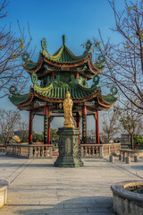 Fototapeta premium Guangzhou city, Guangdong, China. Zini Village, Shawan Town, Panyu Nanyue Garden. The garden features common elements of Chinese Lingnan garden architecture such as ponds, bridges, pavilions. 