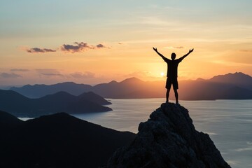 Fototapeta premium A solitary silhouette stands on a rugged mountain peak, arms lifted in exaltation as the sun sets over a serene lake, symbolizing triumph and introspection.