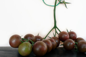 Red cherry tomatoes on a white background isolated on a white background