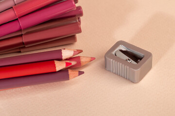Differential pencils for lips and eyebrows close-up. Cosmetic product.