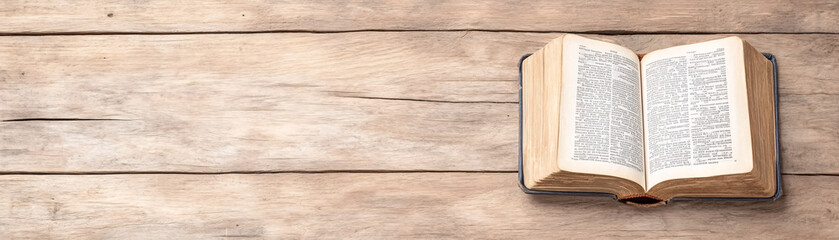 Fototapeta premium A captivating view of an open book resting on a rustic wooden table inviting readers to delve into the world of language and knowledge