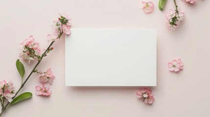 Pink Flowers and Blank Card Mockup on Soft Pink Background