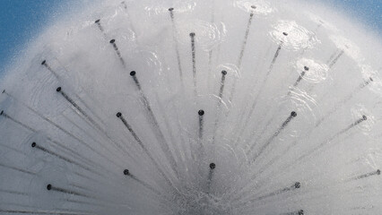Close-up of a planetary fountain with drops frozen in time. Picture for the background