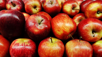 Fresh red ripe apples as background

