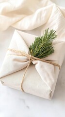 A close-up of a zero-waste Christmas gift wrapped in furoshiki fabric