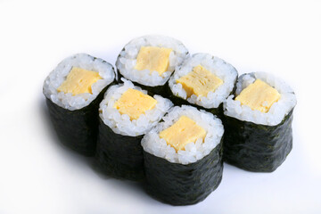 Traditional fresh japanese Tamago Maki roll, Maki Tamago on a white background 