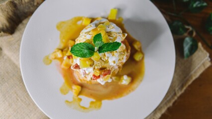 Vanilla ice cream with strawberry on wafell