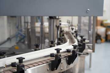 Empty modern conveyor belt of production line, part of industrial equipment in factory plant. Automatic system line