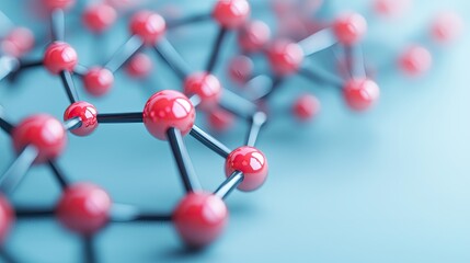 A close-up view of a molecular structure, featuring red spheres interconnected by black lines, representing atoms and chemical bonds on a light blue background.