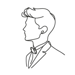 A man in a suit and tie is wearing a bow tie. He is dressed for a formal occasion, and his attire is elegant and sophisticated. The bow tie adds a touch of style and personality to his outfit