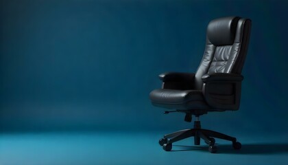 A gray leather office chair with armrests positioned in a dark blue background