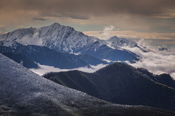 Snow-capped mountains with clouds, Caucasus mountains,