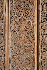 Old wooden carved door. Khiva. Uzbekistan