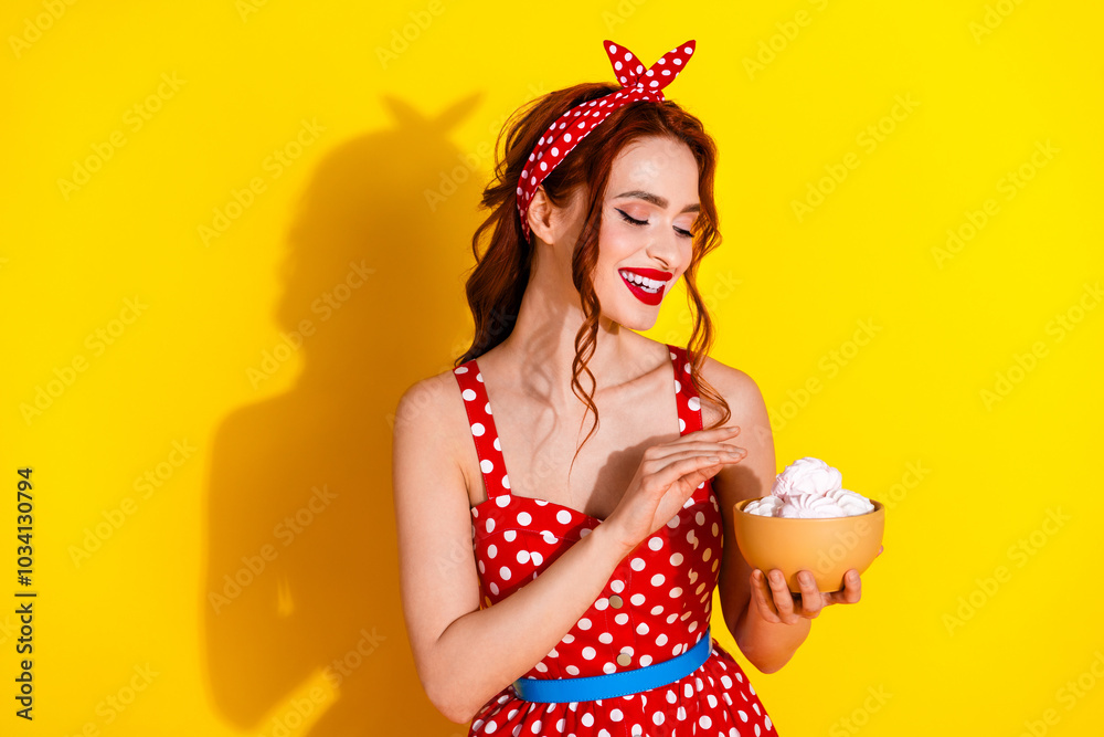 Canvas Prints Photo of charming cheerful lady wear red stylish outfit hand hold tasty zephyr isolated on yellow color background