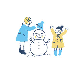 雪だるまで遊ぶ男の子と女の子