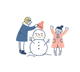 雪だるまで遊ぶ男の子と女の子