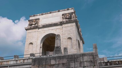 War Memorial Arch Detail: Solemn Symmetry - Low Angle Shot - Sunny Day