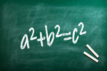Pythagorean theorem a2+b2=c2 the famous formula to calculate the hypotenuse of a triangle written...