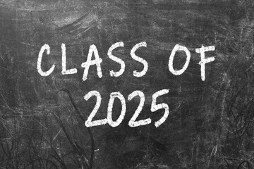 Welcome class of 2025 - chalkboard sign design. An apple and a pencil on either side. A fresh new start of a new school year. Graduation class. Background and poster sign. Chalk writing and drawing.