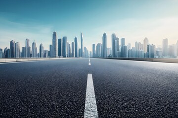 Empty Asphalt Road Leading to a Modern City Skyline