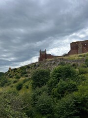 Fototapeta premium ruins of an old castle in the mountains