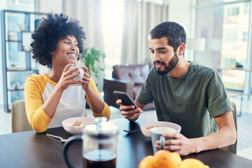 Happy, interracial couple and breakfast with phone for morning, social media or agenda at home. Young, man and woman with smile on mobile smartphone for healthy snack, meal or tips on diet at house