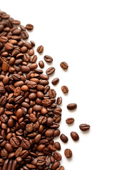 coffee beans pattern with side position provides copy space for text. background concept isolated white