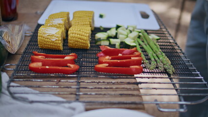 Closeup fresh vegetables grill prepared for barbecue. Unknown person cooking