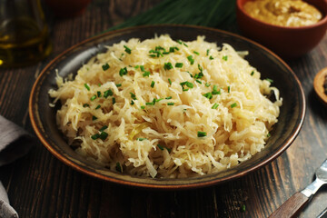 A bowl with traditional German Sauerkraut served in rustic style