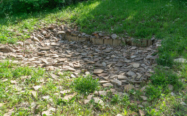 section of Monte Testaccio, an artificial hill in Rome formed by millions of fragments of amphorae used in ancient times for the transport of goods, especially oil