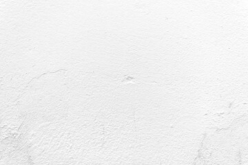 White concrete wall texture background. Uneven render stucco white painted concrete wall texture background. Rough and grunge wall in the sun.	
