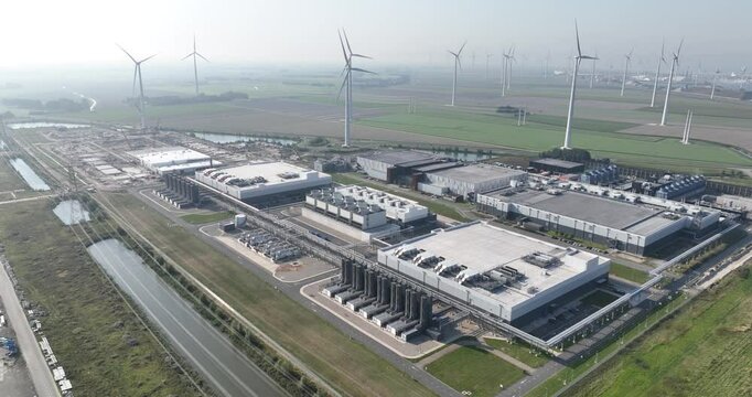 Large search engines company data center in the Eemshaven, Groningen, The Netherlands. Aerial droen video