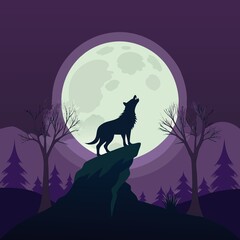 Fototapeta premium wolf howling at the moon