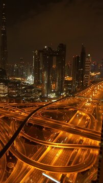 Experience the Stunning and Vibrant Night View of Dubais Dynamic and Beautiful Road Network