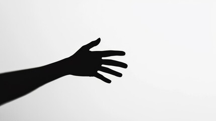 Silhouette of a Hand Reaching Out.