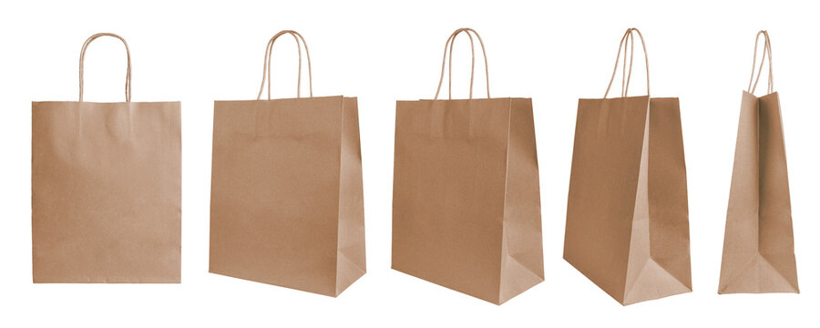 Set of different angles, various perspectives blank brown craft paper bags isolated on white, transparent  background. Eco friendly shopping bag made from recycled paper. Mockup, template