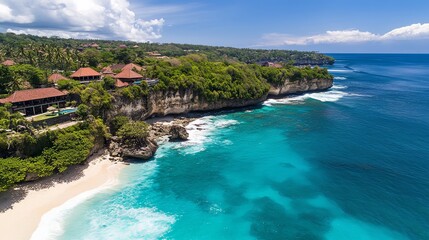 Fototapeta premium An aerial view of Diamond Beach, Bali, showcasing vibrant turquoise waters crashing against the rugged cliffs, with a lush green outcrop jutting into the ocean and a small pristine beach nestled betwe