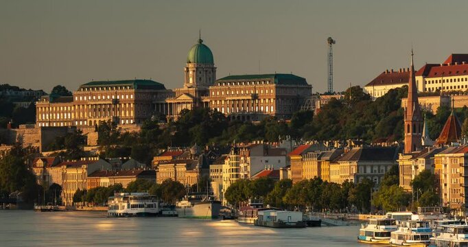 Budapest, Hungary - September 22, 2024: Captivating Sunrise View of Buda from Budapest's Margit Bridge. Timelapse, zoom out transition.