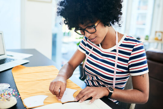 Artisan, thinking and designer with fabric, pattern manufacturing and planning. Woman, seamstress and hobby with textile material, tailor and face mask production for creative small business sewing - Powered by Adobe