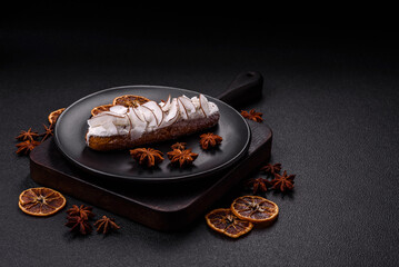 Sweet eclair with custard decorated with coconut slices