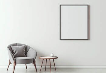 The room is bright with an armchair and a table, an empty frame hangs on the wall, mockup
