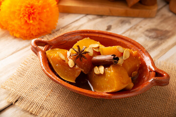Calabaza en Tacha. Spiced Candied Pumpkin. Mexican dessert whose main ingredients are pumpkin and piloncillo, also known as Chacualole or Calabaza en dulce, widely used in Day of the Dead offerings.
