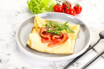 Russian pancake with salmon fish