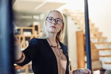 Business, woman and writing on glass in office for financial planning, accountant schedule and...