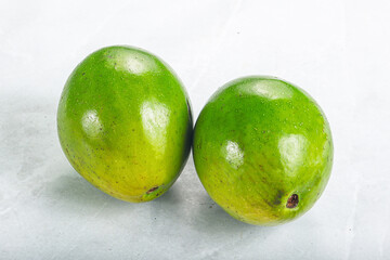 Two ripe green exotic avocado fruit