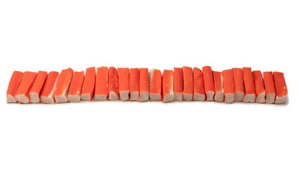 A group of crab sticks isolated on white background. © Nikolay